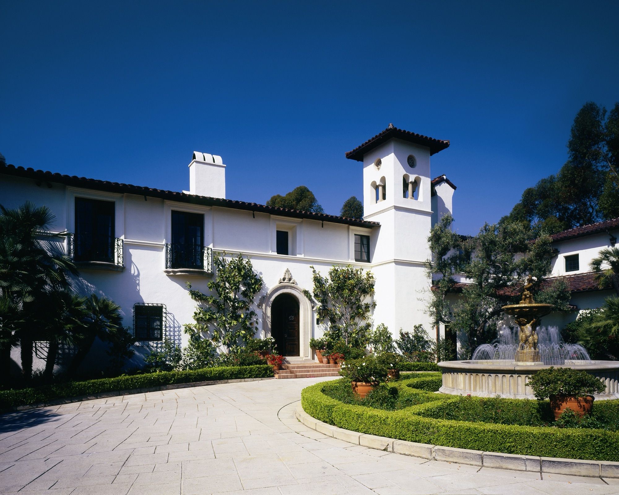 A Spanish Colonial Revival entrance courtyard in Holmby Hills