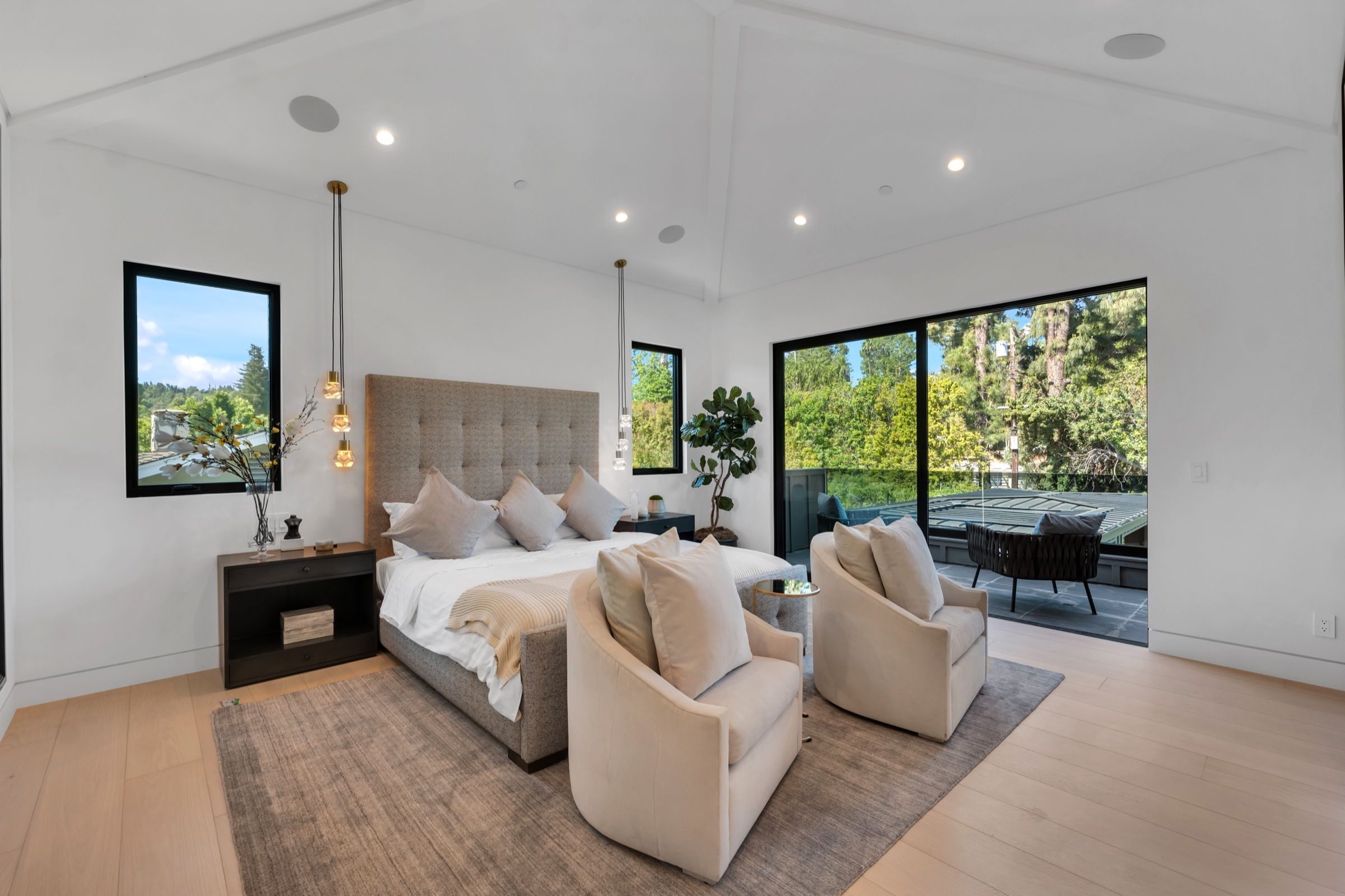 The primary bedroom opening to the garden